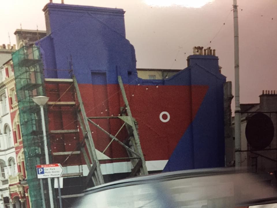 Boat On Side Of Old Building